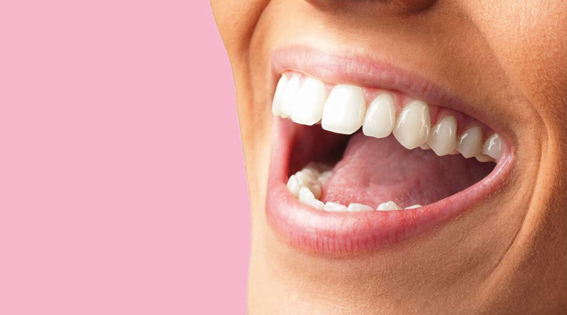 A stylized illustration showing a vibrant, healthy mouth with glistening white teeth and pink gums, suggesting the benefits of natural oral defenses and optimal hydration. A subtle shimmering effect highlights the cleanliness and vitality of a well-maintained oral environment.